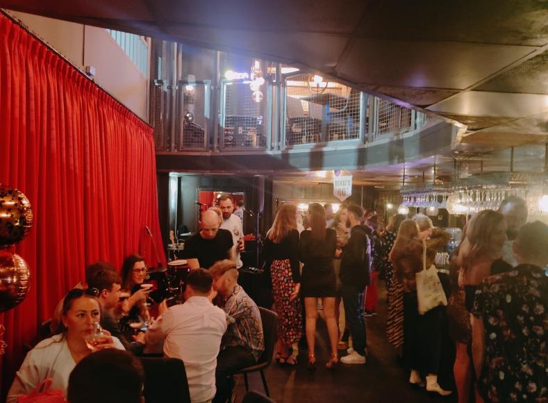 Bar -⁠OH full of people